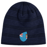The EMB Canterbury Fiji Shield Beanie is a fashionable accessory featuring navy and black stripes with a partial flag crest design.