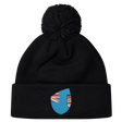 Cheer for Fiji with the Fiji Shield Pom Pom Beanie by EMB Canterbury. This stylish black beanie features a pom-pom and a blue emblem with a flag design, perfect for showcasing your rugby spirit and allegiance to the Fiji Shield.