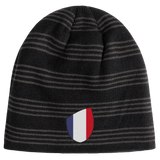 The EMB Canterbury France Shield Beanie is gray and black with a France Shield emblem displaying vertical blue, white, and red stripes.