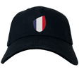 Introducing the France Shield Flex Drill Cap by EMB Canterbury, showcasing black fabric with a France shield design and vertical stripes in blue, white, and red.
