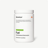 A white container labeled “Momentous Fuel” by Momentous in strawberry lime flavor, featuring a carbohydrate and electrolyte formula with clean ingredients for sustained energy and hydration during training.