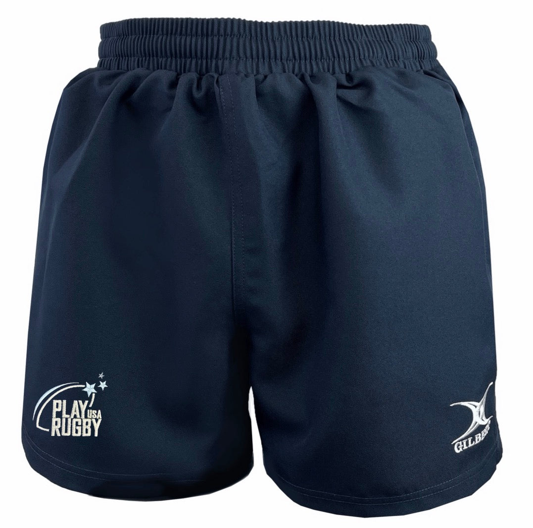 Play Rugby USA Saracen V3 Match Shorts by Gilbert in navy blue with an elastic waistband, featuring both "Play Rugby USA" and EMB Gilbert logos on the front.