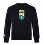 The Las Colinas Rugby Club Crew by Canterbury, from WRS Canterbury, is a black sweatshirt featuring the "Las Colinas Rugby" crest on the chest, signature Club Crew style, and an embroidered CCC logo on the left sleeve.