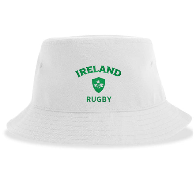 The Nations of Rugby Ireland Rugby Sustainable Bucket Hat by EMB S&S Activewear is a white bucket hat crafted from recycled polyester, featuring "Ireland Rugby" and a green shamrock emblem on the front for an eco-friendly and stylish choice.