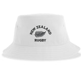 Introducing the Nations of Rugby New Zealand Rugby Sustainable Bucket Hat by EMB S&S Activewear—a white bucket hat made from recycled polyester, featuring "New Zealand Rugby" and a black fern logo on the front for eco-conscious fans.