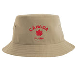 The Nations of Rugby Canada Rugby Sustainable Bucket Hat by EMB S&S Activewear is crafted from beige recycled polyester and features "CANADA RUGBY" and a red maple leaf embroidered on the front.