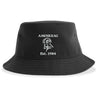 The Amoskeag Rugby Sustainable Bucket Hat by EMB S&S Activewear is a black, custom-made hat featuring "AMOSKEAG" text, a stylized ram logo, and "Est. 1984" embroidered in white on the front; this eco-friendly bucket hat is crafted with care and designed for lasting style.