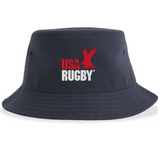 The USA Rugby Throwback Sustainable Bucket Hat by EMB S&S Activewear features a classic navy blue design with "USA RUGBY" and a bold red eagle logo on the front. Combining iconic heritage with modern flair, this hat is perfect for fans seeking a retro rugby style.