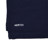 Close-up of the Leinster 24/25 Club Essential Polo by Castore, a navy blue lightweight, breathable polo with "AERTEK" embroidered in white on the lower edge.