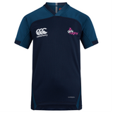 The Girls Rugby Vapodri Evader Jersey by EMB Canterbury is a navy blue jersey with turquoise details, embroidered logos, and moisture-wicking tech to keep you comfortable and dry during intense matches.