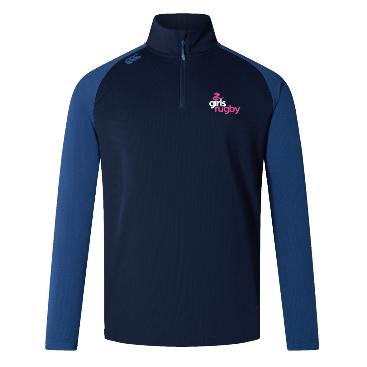 The EMB Canterbury Girls Rugby Elite First Layer is a navy and blue long-sleeve rugby pullover with a half-zip, ideal for rugby training. It features "girls rugby" and a pink logo on the chest, enhanced with quick-drying VapoDri technology to keep you comfortable and dry.