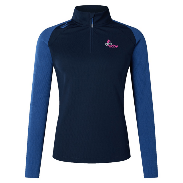 The EMB Canterbury Girls Rugby Elite First Layer is a navy long-sleeve, half-zip sports top with a chest logo and VapoDri technology to keep you dry and comfortable.
