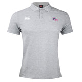The Girls Rugby Waimak Polo by EMB Canterbury features a light grey design, three-button collar, Canterbury logo on the right chest, and "Girls Rugby" logo on the left chest.