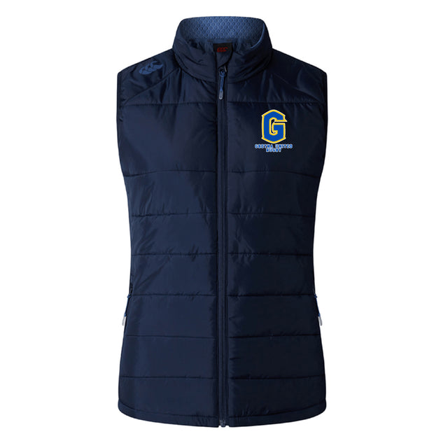 The EMB Canterbury Gretna United Rugby Women's Elite Microlite Gilet is a navy blue, sleeveless, insulated vest with a zip front and features a yellow and blue "G" logo on the left chest.