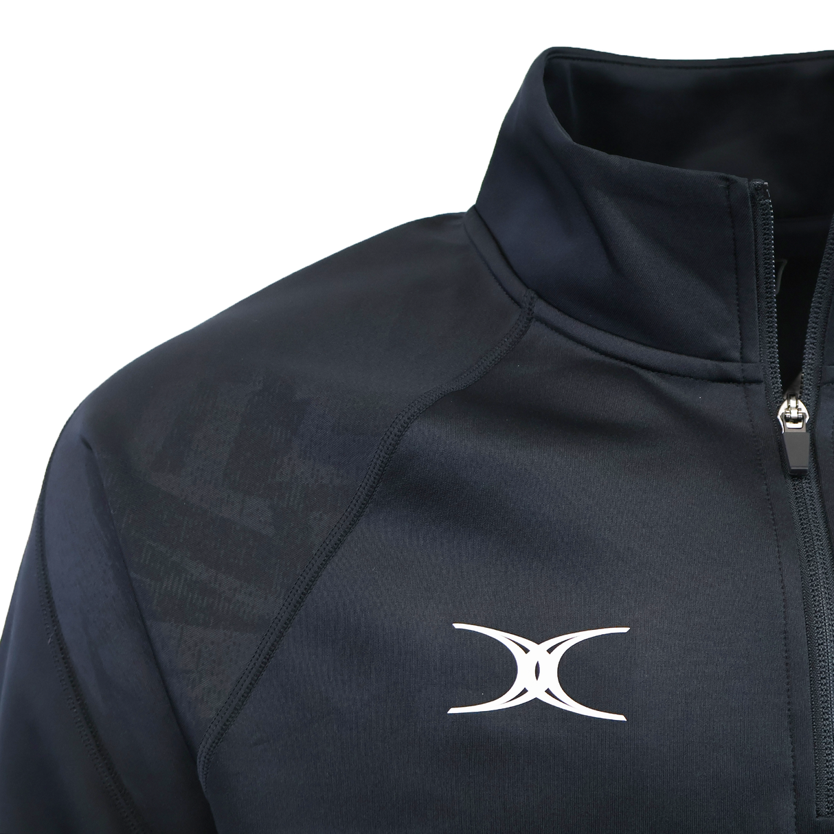 Close-up of the Gilbert GTS 1/4 Zip Poly Pullover, a black rugby training top featuring a white abstract chest logo and a partially zipped high collar, designed by Gilbert.