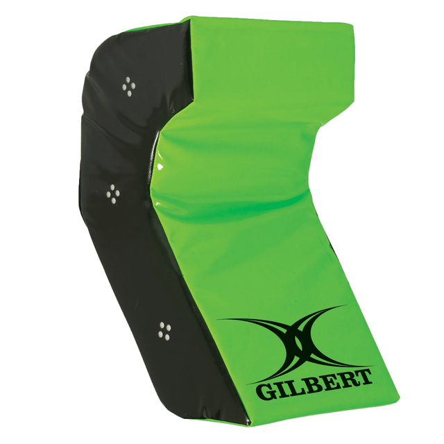 The Gilbert Rugby Green Technique Wedge by Hadar, a green and black foam tackle shield, is an essential tool for perfecting your tackling technique.