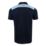 The Gilbert Photon II Polo is a navy blue short-sleeve polo with a light blue shoulder panel, "GILBERT" on the upper back, and lightweight, moisture-wicking fabric for all-day comfort.