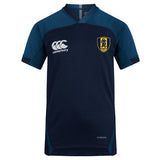 Gotham Knights Vapodri Evader Jersey by EMB Canterbury in dark blue, showcasing a yellow and black lion crest on the chest, designed with VapoDri technology for ultimate comfort.