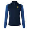 The Gotham Knights Women's Elite First Layer by Canterbury from EMB Canterbury is a long-sleeved navy and blue sports top with a quarter zip and a yellow and black crest on the left chest, designed from moisture-wicking honeycomb fabric to ensure comfort.