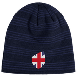Introducing the EMB Canterbury Great Britain Shield Beanie: a blue knitted gem featuring a shield-shaped patch with a red, white, and blue cross design inspired by Great Britain's iconic flair.