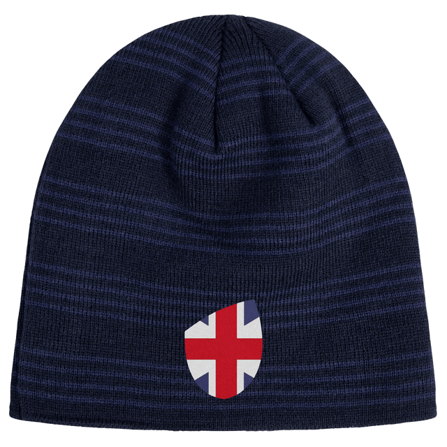 Introducing the EMB Canterbury Great Britain Shield Beanie: a blue knitted gem featuring a shield-shaped patch with a red, white, and blue cross design inspired by Great Britain's iconic flair.
