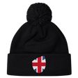 The EMB Canterbury Great Britain Shield Pom Pom Beanie combines style and iconic pride with a black design featuring a Great Britain flag patch on the front.