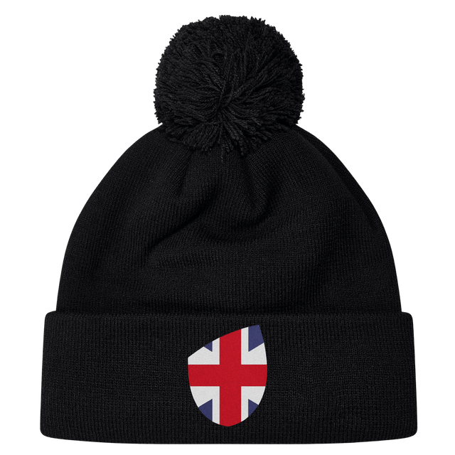 The EMB Canterbury Great Britain Shield Pom Pom Beanie combines style and iconic pride with a black design featuring a Great Britain flag patch on the front.