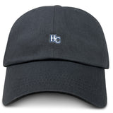 The Holy Cross Adult Low-Profile Cotton Twill Dad Cap by EMB S&S Activewear is a black hat with a small white and blue "HC" team logo embroidered on the front center.