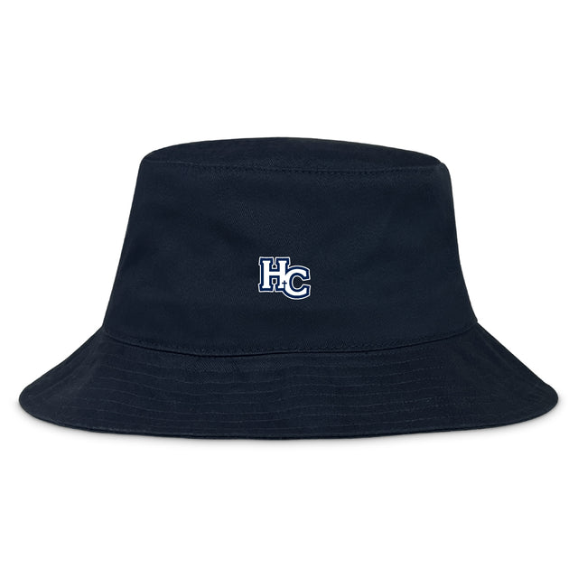 The Holy Cross Crusher Bucket Cap by EMB S&S Activewear is a black cotton twill hat featuring "HC" in white and blue embroidery on the front, blending classic style with sun protection.