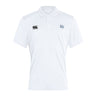 The Holy Cross Club Dry Polo by EMB Canterbury is a white short-sleeve polo with a collar, black Canterbury logo on the right chest, and blue "HC" initials on the left. Made with Vapodri Technology for cool, breathable comfort.