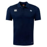 The Holy Cross Club Dry Polo by EMB Canterbury features navy blue fabric, short sleeves, collar, button placket, "Canterbury" logo at right chest, "HC" initials at left chest, and Vapodri Technology for breathability.