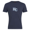 The Holy Cross Club Plain Tee by WRS Canterbury is a navy blue cotton blend t-shirt with "HC" in white and blue outlined font centered on the chest.