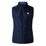 The Holy Cross Women's Elite Microlite Gilet by EMB Canterbury is a navy blue, sleeveless vest with a front zipper, "HC" chest logo, and Thermoreg bonded fleece for warmth and style.