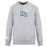The Holy Cross Club Crew Sweatshirt by Canterbury is a light gray, ultra soft long-sleeve from WRS Canterbury, featuring a large navy and white "HC" logo on the chest and a small embroidered CCC logo on the left sleeve.