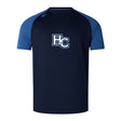 The Holy Cross Elite Training Tee by WRS Canterbury features navy and blue short sleeves, a white "HC" chest logo, lightweight durable tee construction, and Vapodri fabric for superior comfort and performance.