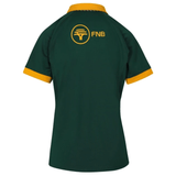 This Women's Springboks Replica Home Jersey by Nike features a vibrant green color, yellow cuffs, and a yellow logo near the neckline. Showcasing "FNB" on the back, this short-sleeve rugby jersey blends style and support perfectly.