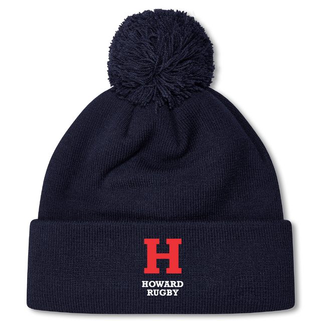 The Howard University Pom Pom Beanie by EMB Canterbury features a navy blue design with a pom-pom, showcasing a red "H" and "HOWARD RUGBY" in white on the front. It’s the perfect stylish and warm Rugby Bobble Hat for fans.