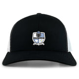 The Austin Huns Rugby Retro Trucker Cap by EMB S&S Activewear features a black-and-white design with the team crest, helmeted figure, shield, and "EST. 1972" embroidered on the front. Snapback closure provides a comfortable fit.