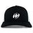 The Clarksville Headhunters Retro Trucker Cap by EMB S&S Activewear features a black and white design, curved brim, white "HH" embroidery on the front, and a classic snapback closure.