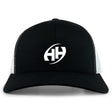The Clarksville Headhunters Retro Trucker Cap by EMB S&S Activewear features a black and white design, curved brim, white "HH" embroidery on the front, and a classic snapback closure.