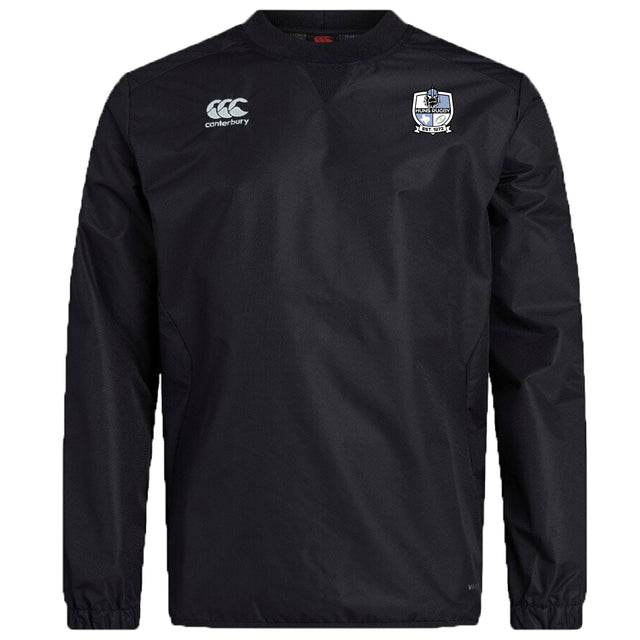 The Austin Huns Rugby Club Vaposhield Contact Top by Canterbury is a black long-sleeve pullover with the EMB Canterbury logo on the right chest, a blue shield crest on the left, and Vaposhield tech for enhanced comfort.