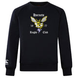 The Hornets Rugby Club Club Crew Sweatshirt by WRS Canterbury is an ultra-soft black sweatshirt with a large hornet graphic, "Hornets Rugby Club 1977" on the front, and an embroidered CCC logo on the left sleeve.