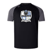 The Austin Huns Rugby Elite Training Tee by WRS Canterbury features black short sleeves, gray shoulders, a "Huns Rugby" team logo with "EST. 1972" on the front, and is made from lightweight Vapodri fabric for comfort and performance.