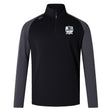The Austin Huns Rugby Elite First Layer by EMB Canterbury is a black and dark grey long-sleeve quarter-zip pullover with VapoDri tech, crest logo on the left chest, and a small right shoulder logo—perfect as a rugby training top.
