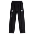 The Austin Huns Rugby Cuffed Hem Stadium Pant by EMB Canterbury features an elastic waistband and cuffs, with white Canterbury branding and a shield logo—combining comfort and style for on or off the field.