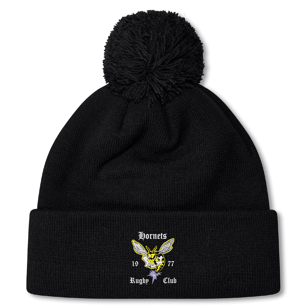 The Hornets Rugby Club Pom Pom Beanie by EMB Canterbury is a black fleece-lined knit hat with a pom-pom and embroidered "Hornets Rugby Club 1977" logo—perfect for rugby fans.