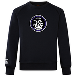 The ultra-soft Helena Youth Rugby Club Crew Sweatshirt by WRS Canterbury features a circular "Helena Hydra" logo with two intertwined serpents, and has an embroidered CCC logo on the left sleeve.