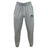 Gray sustainable Helena Youth Rugby Leisure Sweatpants by EMB Canterbury feature a drawstring waistband, white logo on the left hip, and a circular emblem on the right thigh.