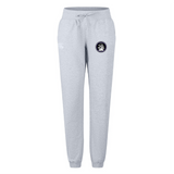 The Helena Youth Rugby Women's Leisure Sweatpant by EMB Canterbury features a drawstring waist and small logo on the left leg, crafted from organic cotton for ultimate comfort.