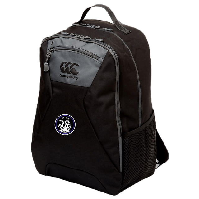 The Helena Youth Rugby Medium Backpack by EMB Canterbury in black and grey offers ergonomic shoulder straps, a zippered front pocket, a side mesh pocket, and an embroidered Canterbury logo.